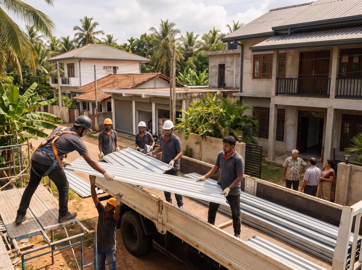 SHA Roofing team unloading roofing sheets and C purlins from a delivery truck at a building site in Sri Lanka